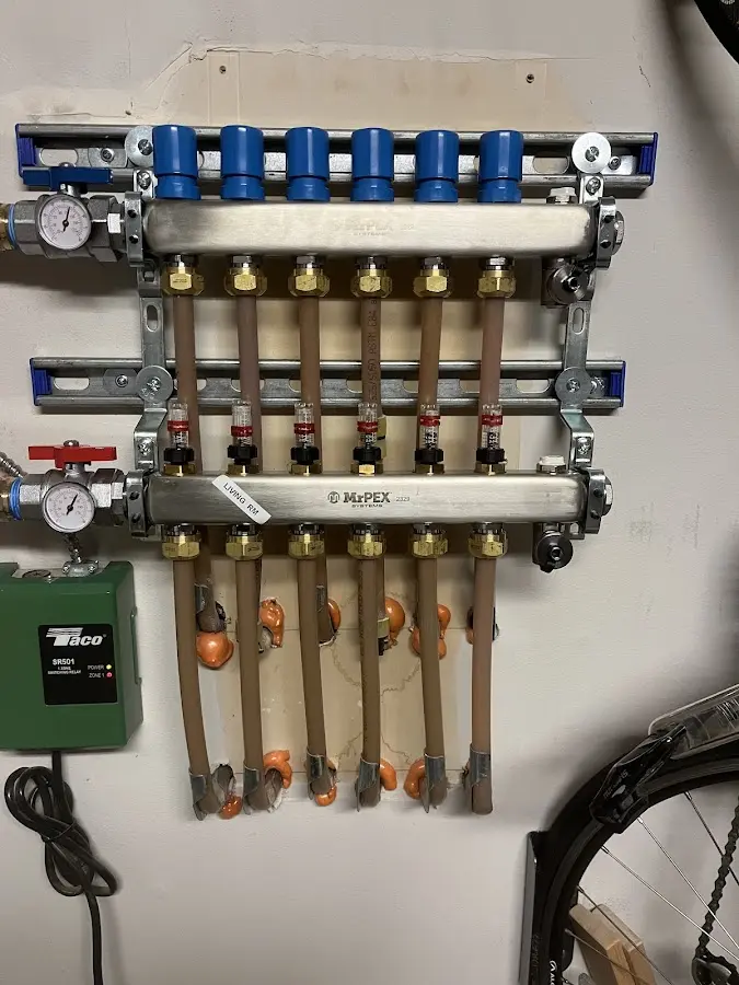 Plumber performing Water Heater Repair at a residential property in West Milwaukee